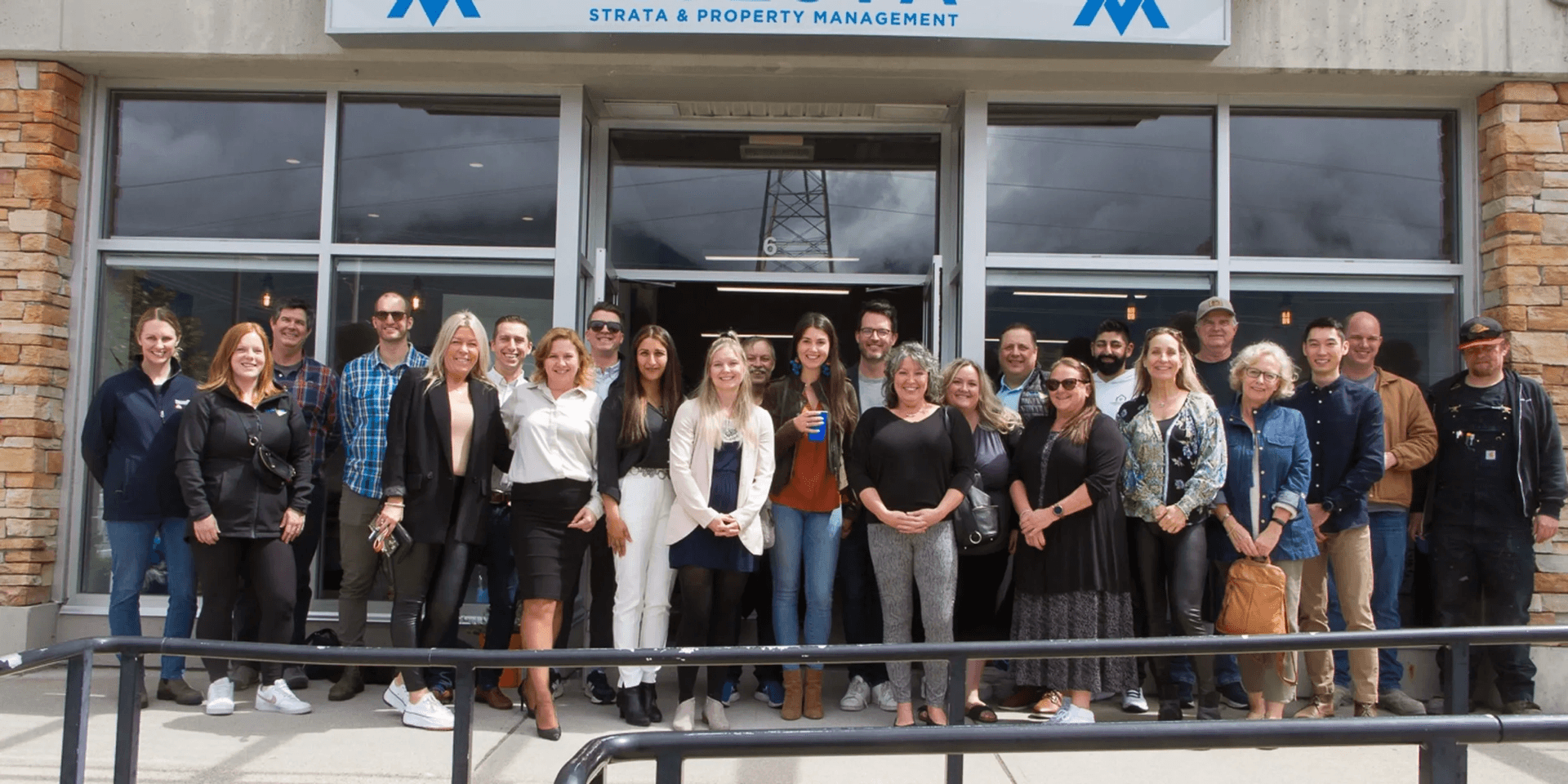 Avesta team standing in front of the Garibaldi Highlands office