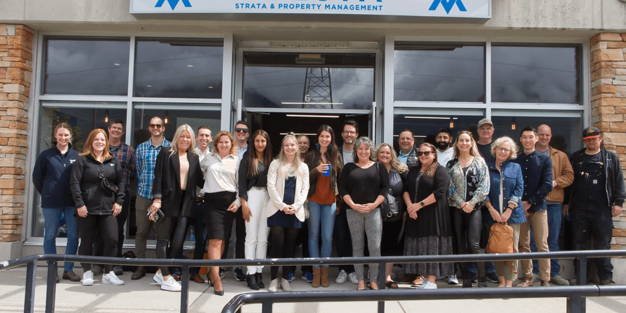 Avesta team standing in front of the Garibaldi Highlands office